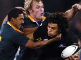 Doug Howlett is wrapped up by the Boks defence -  Fotopress/Ross Land
